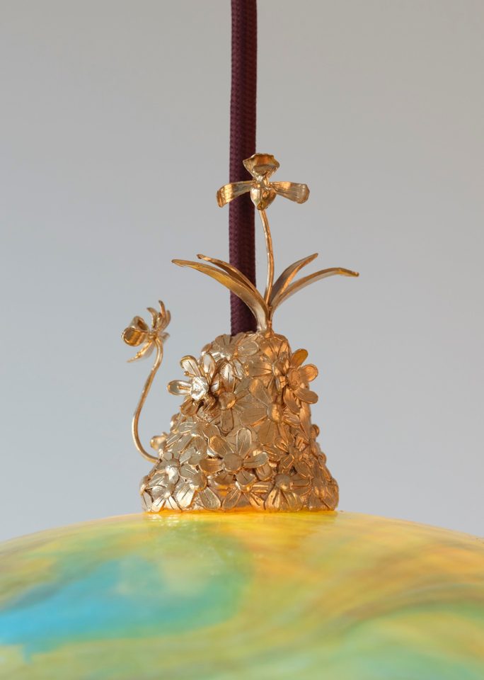 Detail of the gilded floral crown on the Lauba lamp